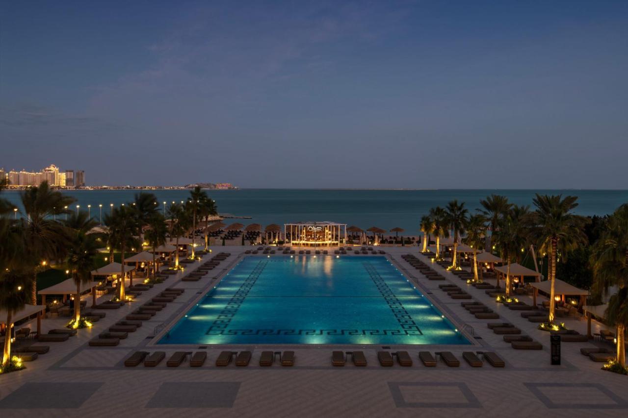 The St. Regis Doha Hotel Exterior photo The pool at the Jumeirah Beach Hotel